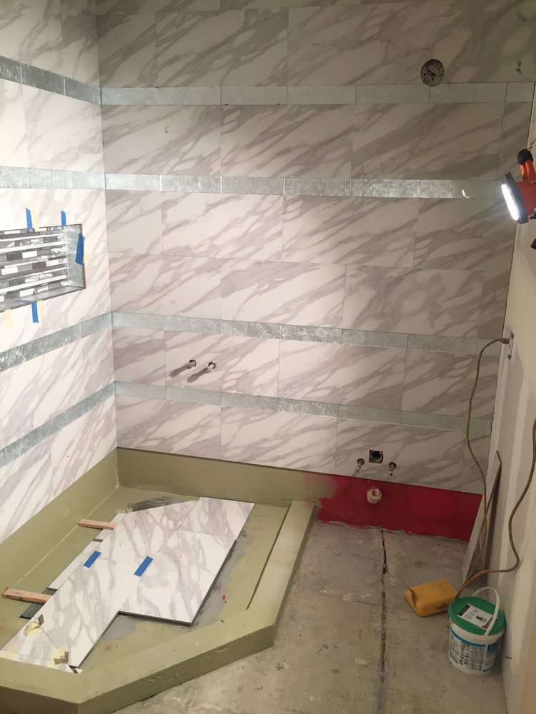 Shower plumbing and waterproofing during a bathroom remodel