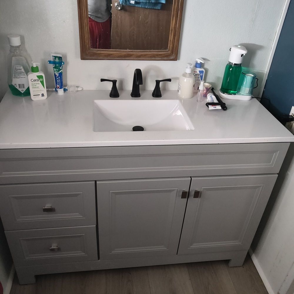 Sink installation in a mobile home bathroom