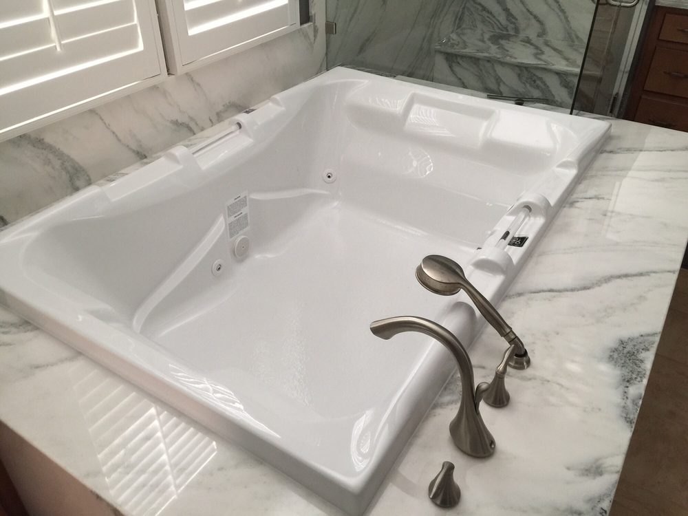 New bathtub installed in a mobile home bathroom