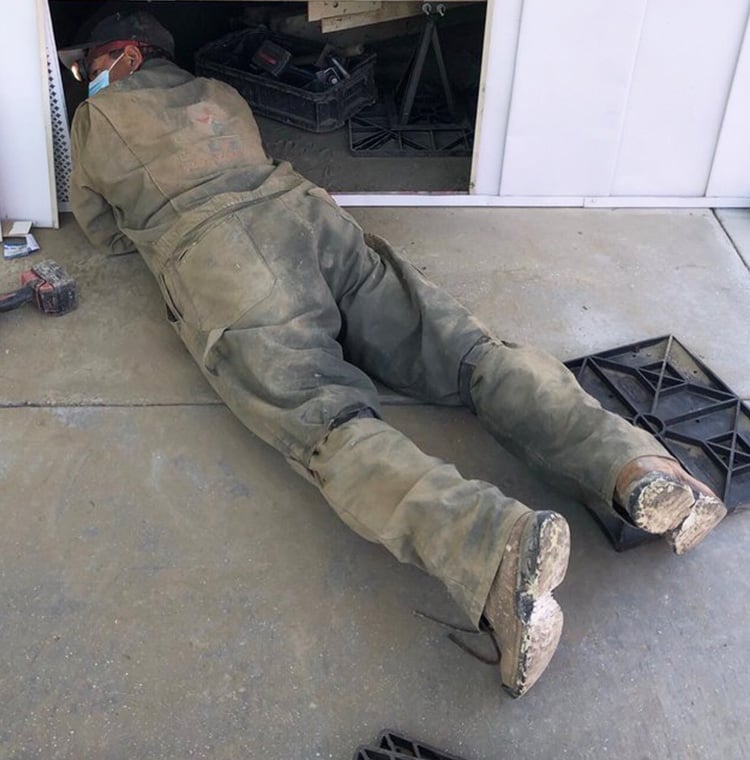 A man working on a mobile home