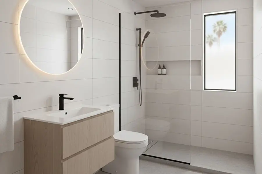 Modern mobile home bathroom remodel in Huntington Beach with walk-in glass shower, floating vanity, and space-saving layout for improved comfort and storage
