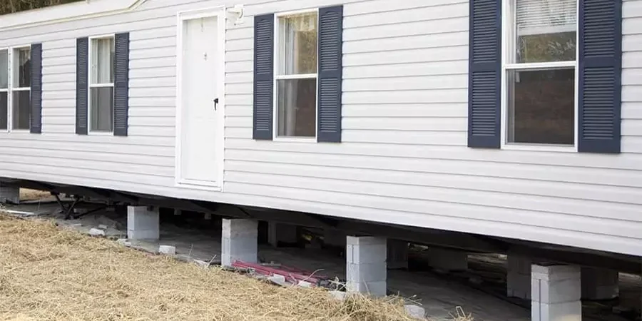 A white color mobile home